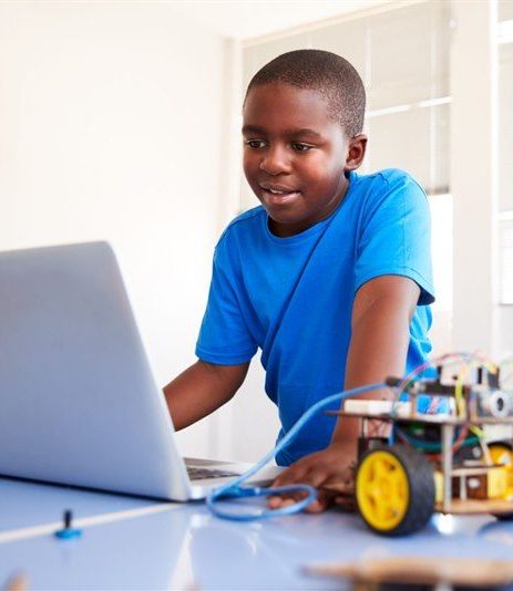 Boy learning robotics